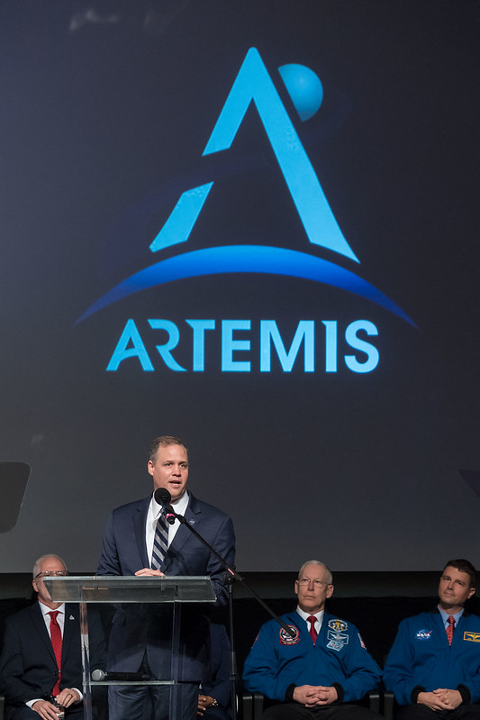 NASA Administrator Jim Bridenstine with Artemis logo in background
